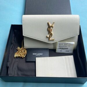 Saint Laurent Cream Clutch Bag with Gold Accents